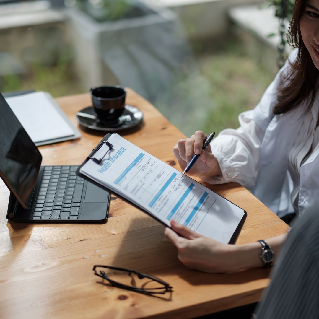 insurance agent going through paperwork